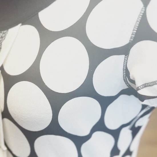 Close-up of the Ambiente B&W Polka Dot Blouse showcasing its unique polka dot pattern on a comfortable cotton fabric.