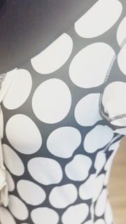 Close-up of the Ambiente B&W Polka Dot Blouse showcasing its unique polka dot pattern on a comfortable cotton fabric.