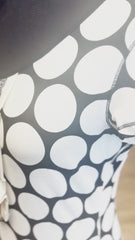 Close-up of the Ambiente B&W Polka Dot Blouse showcasing its unique polka dot pattern on a comfortable cotton fabric.