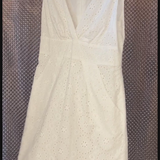 Michael Kors white summer dress with eyelet design, perfect for stylish comfort in warm weather.