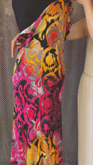 Versace Water Print Dress featuring vibrant colors and elegant design, perfect for showcasing confidence and beauty.