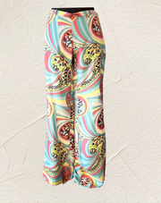Seventy Abstract Print Pants in colorful swirling patterns, crafted from high-quality silk for elegance and comfort.