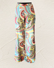 Seventy Abstract Print Pants in colorful swirling patterns, crafted from high-quality silk for elegance and comfort.