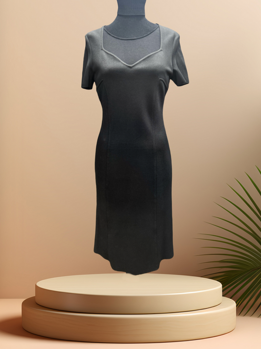St John Black Dress showcasing a classic body fit design, perfect for elegant occasions and crafted from high quality materials.