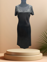 St John Black Dress showcasing a classic body fit design, perfect for elegant occasions and crafted from high quality materials.