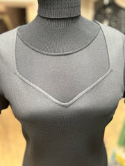 Close-up of a stylish dark grey dress featuring a turtleneck and unique neckline design for an elegant look.