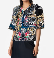 Versace Black Floral Totem Blouse featuring elegant floral and totem patterns, perfect for stylish outfits.